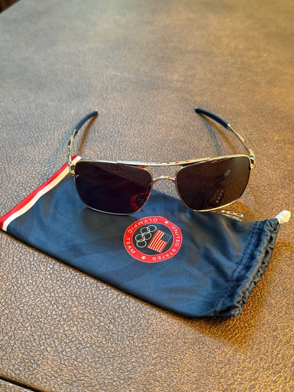 Oakley Team USA Olympic Sunglasses in Silver with Black Lenses 004061